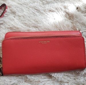 Coach zipped coral red wristlet